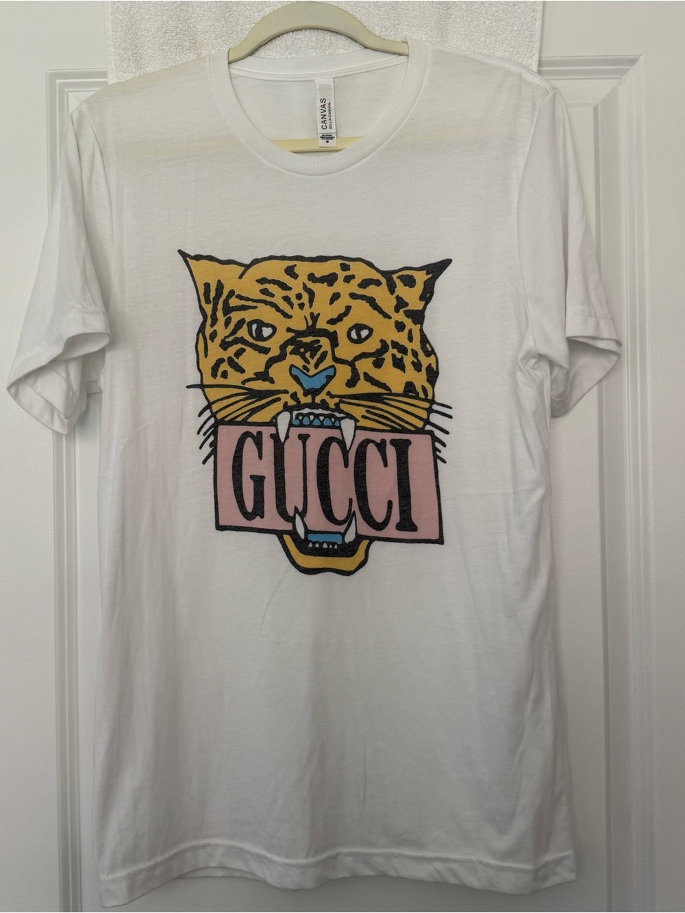 Gucci White Tee with Yellow Leopard and Pink Logo Graphic